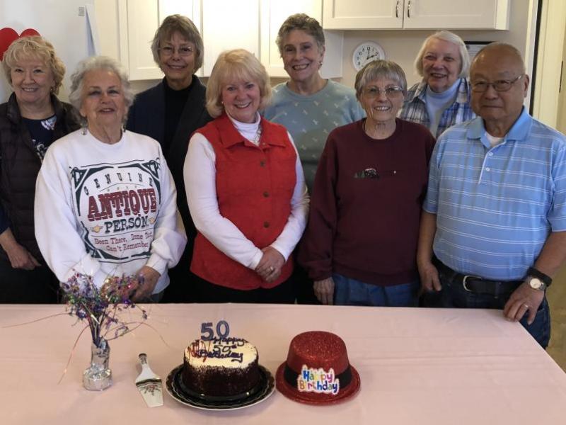 CCHS Board members and volunteers celebrate 50th anniversary.