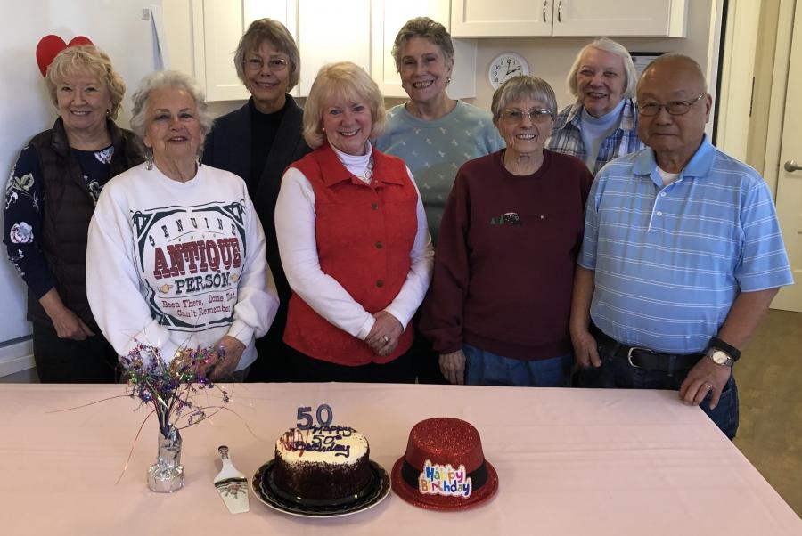 CCHS Board members and volunteers celebrate 50th anniversary.