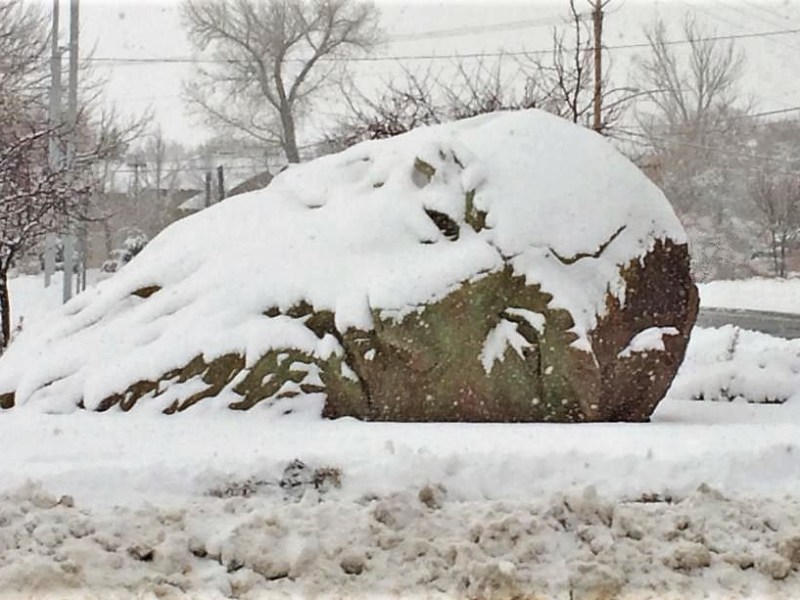 Mind of DaVinci sculpture at the Carson City Community Center is frosted with snow.