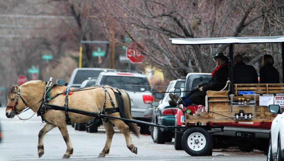 Horse-drawn taxi crosses Nevada Street on its way to Telegraph Square.