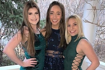CHS students Angela Cirone, Cassia Guistra, and Sophia Caccioppo preparing to attend the  Winterfest Part II dance.
