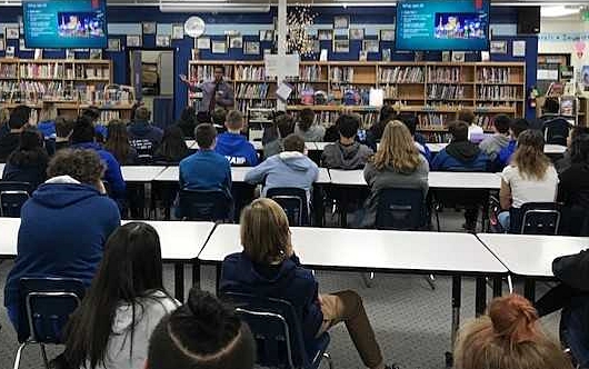CHS Sergio Trejo Jr. speaking at Carson Middle School to 8th graders about the CHS Career Center.
