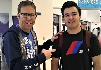 CHS teacher Phil Brady greeting one of his students Noah Ramos March 14 during the fourth Mob the Halls at CHS.
