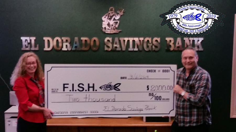 El Dorado manager giving big check to FISH