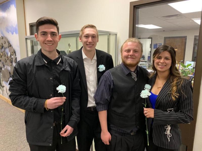 CHS Seniors Evan Bowman, Ryan Wright, Jordan Woods and Erika Nauyoks celebrate after their presentations.