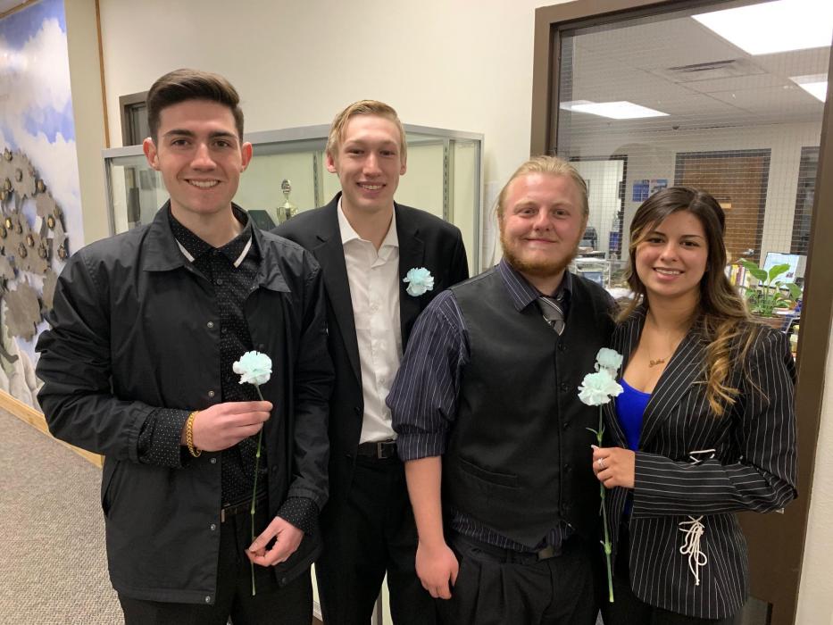 CHS Seniors Evan Bowman, Ryan Wright, Jordan Woods and Erika Nauyoks celebrate after their presentations.