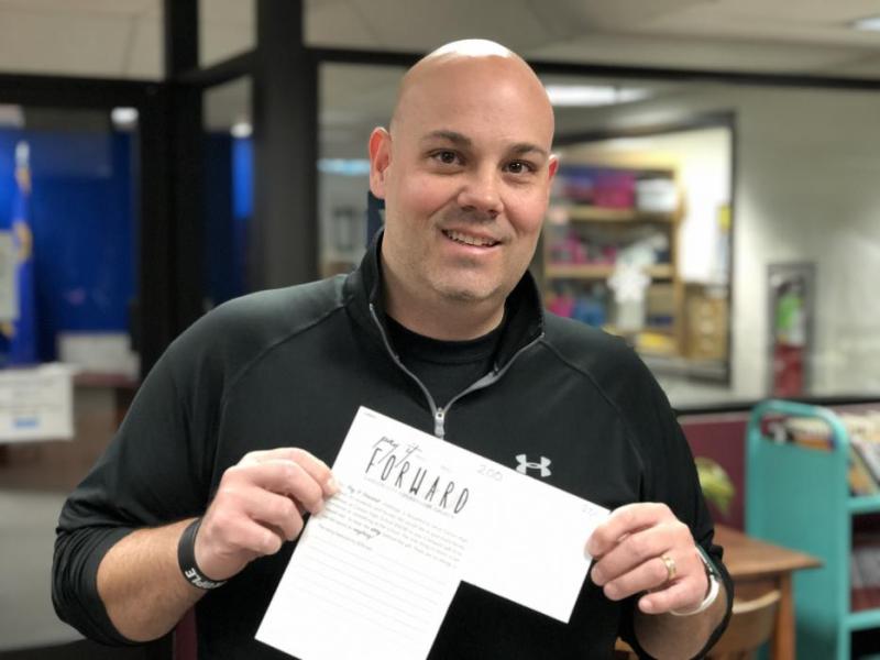 Pastor Chris White of Fountain Foursquare Church in Carson City holds an envelope with $50 cash.