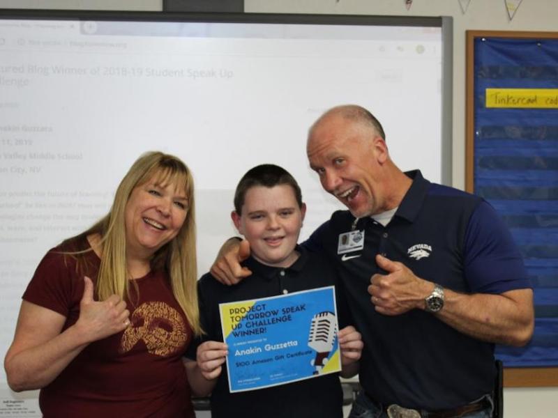 7th grader Anakin Guzzetta is joined by STEM Coach Lisa Stocke-Koop and EVMS Principal Lee Conley.