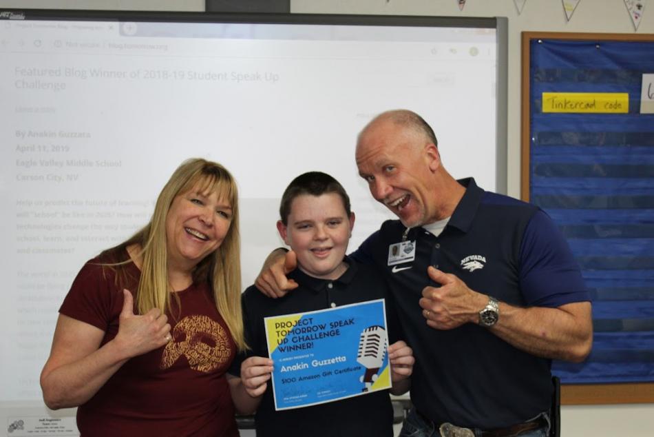 7th grader Anakin Guzzetta is joined by STEM Coach Lisa Stocke-Koop and EVMS Principal Lee Conley.
