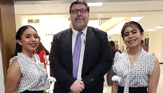 CHS English teacher Patrick Tobin and two of his students celebrating the successful completion of the Senior Project.