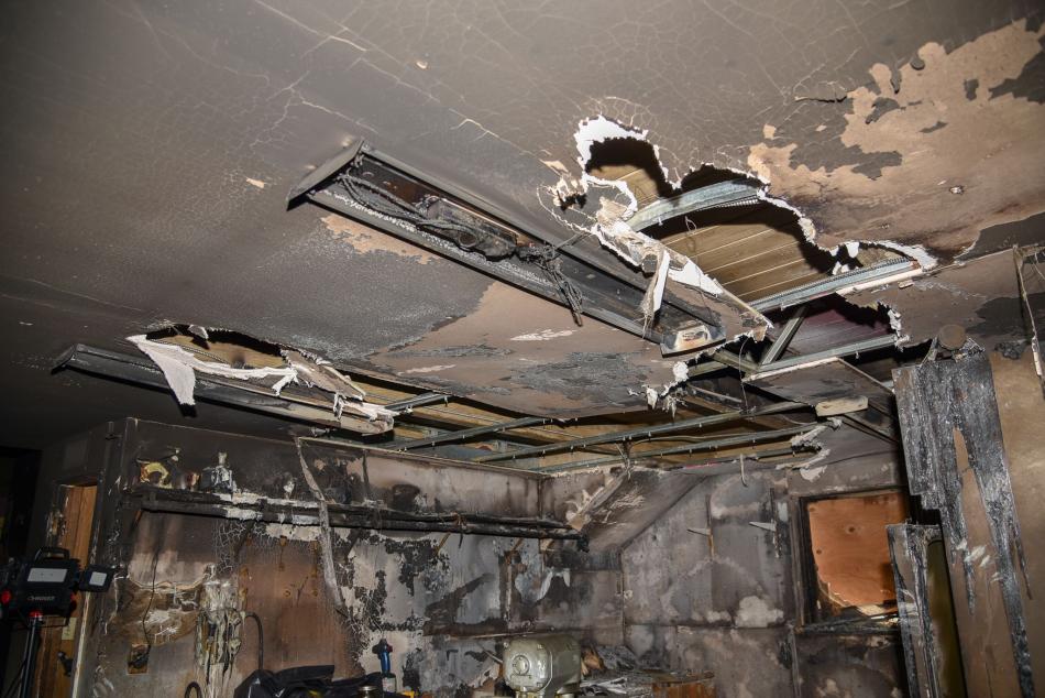 The ceiling and wall areas of the laundry room received the most structural damage.