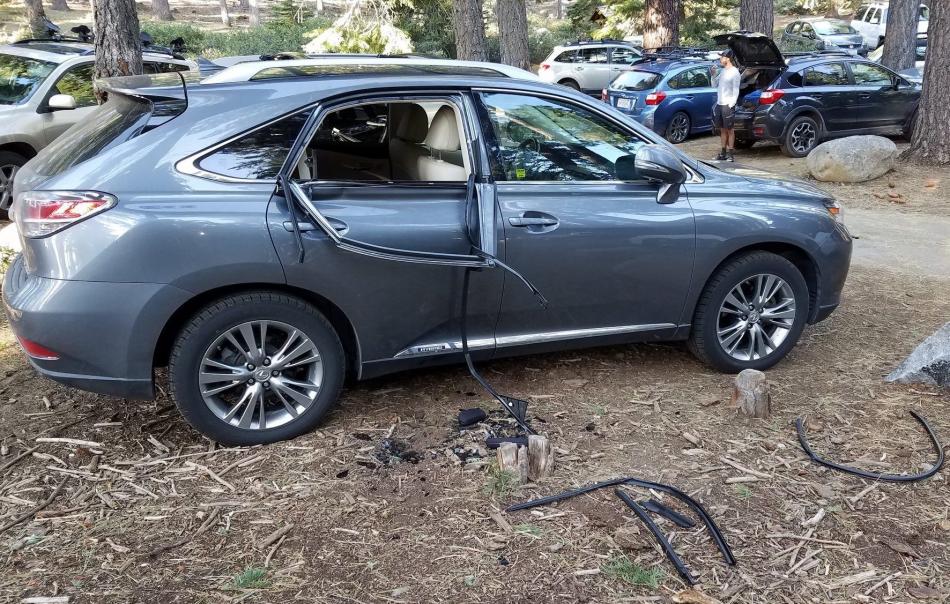 Bear damaged vehicle at Bayview Trailhead. Photo by Lake Tahoe Basin Management Unit, U.S. Forest Service.