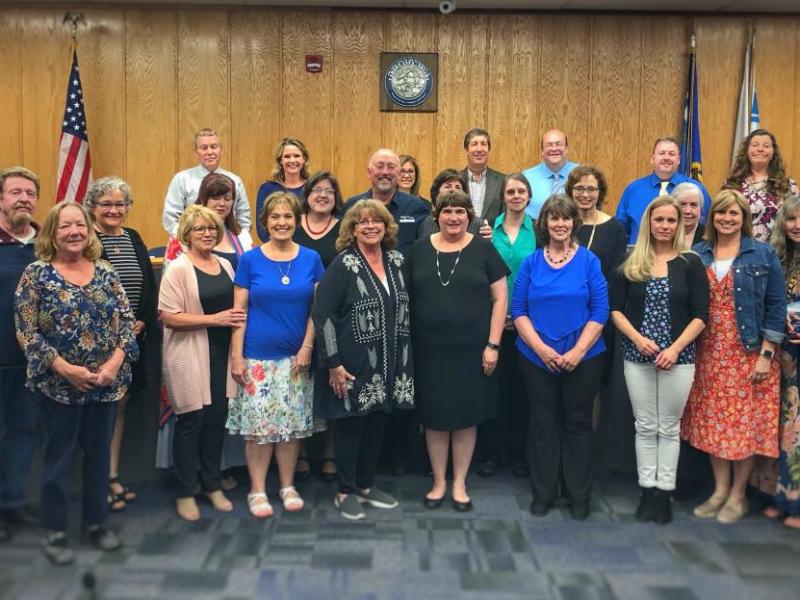 The retiring employees were honored Tuesday night at the Carson City School District Board meeting.