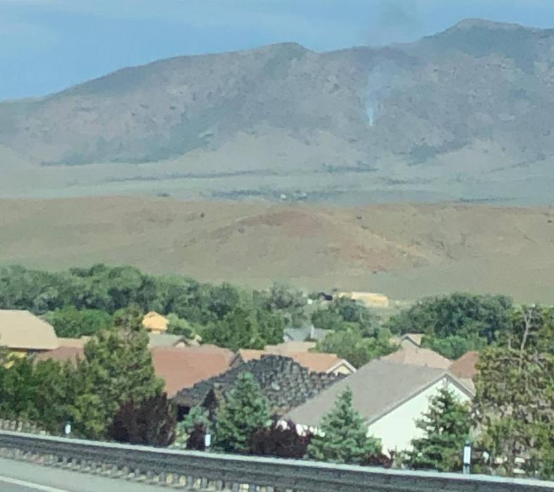 Photo provided by Lyon County of small fire burning near Dayton.