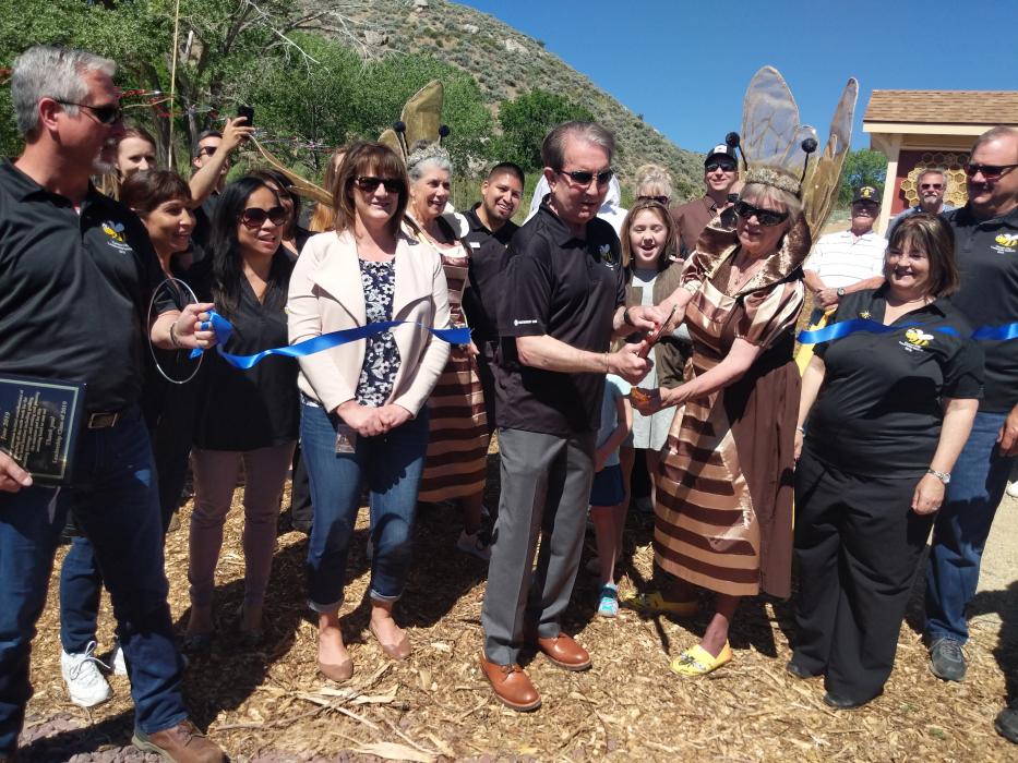 Mayor Bob Crowell cut the ribbon to cap-off the Carson City Bee Habitat's grand opening on Friday.