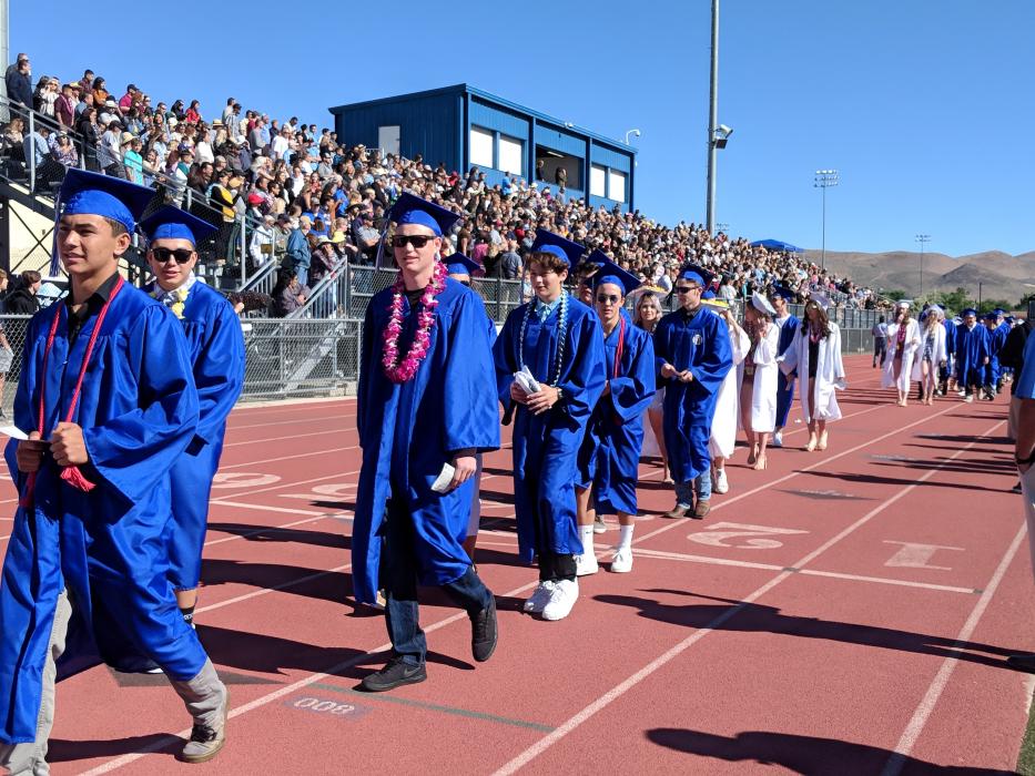 Seniors eventually made their way to their seats, but they made a lap around the track first.