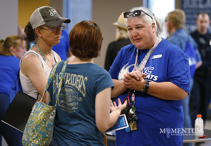 Gayle Etchamendy, right, talks with a prospective student during Community Night at Western Nevada College in Carson City.