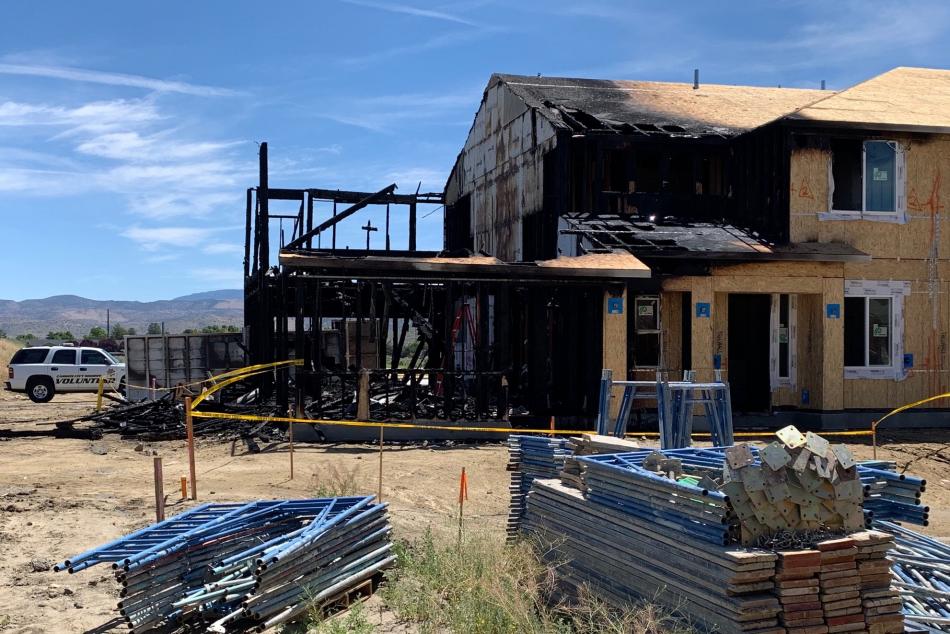 Photo by Kirk Caraway: The fire destroyed one unit and caused moderate damage to another.