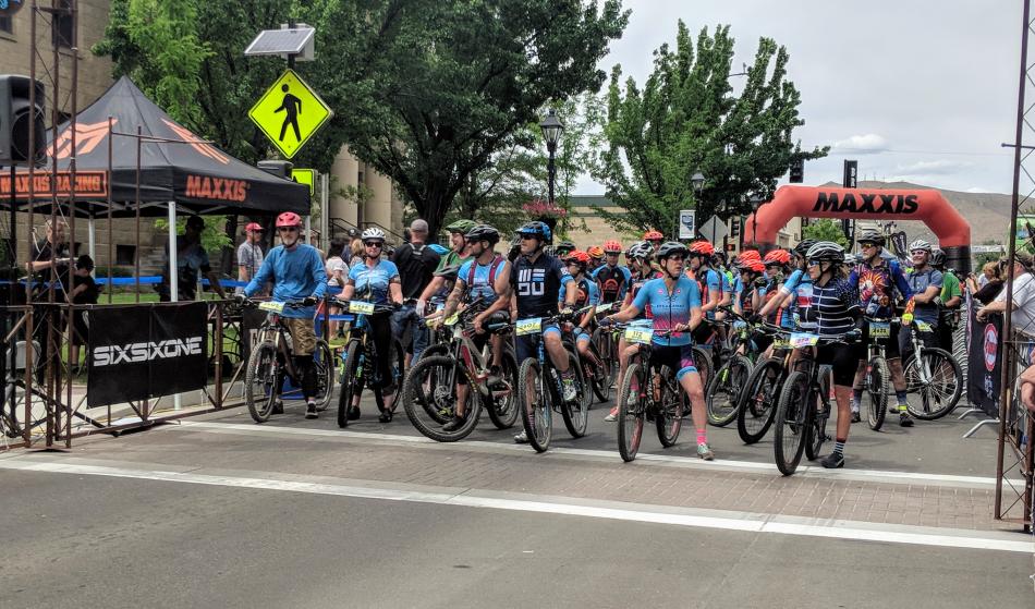 Riders lined up at the starting line, anxious to begin the race.