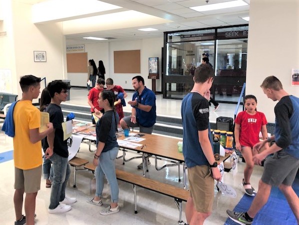 CHS Fellowship of Christian Athletes booth at Freshman Orientation.