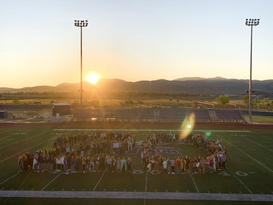 CHS Class of 2019-2020 Senior Sunrise at early in the morning on the football field.