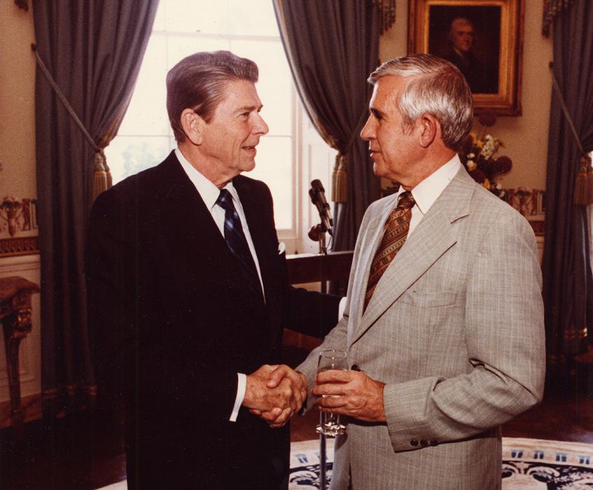 Ronald Reagan and Paul Laxalt shaking hands in the Oval Office. Photo courtesy of Special Collections and University Archives.