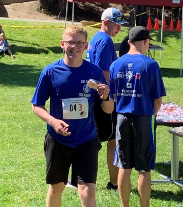 CHS Orienteeering student Nussbaumer and his medal.