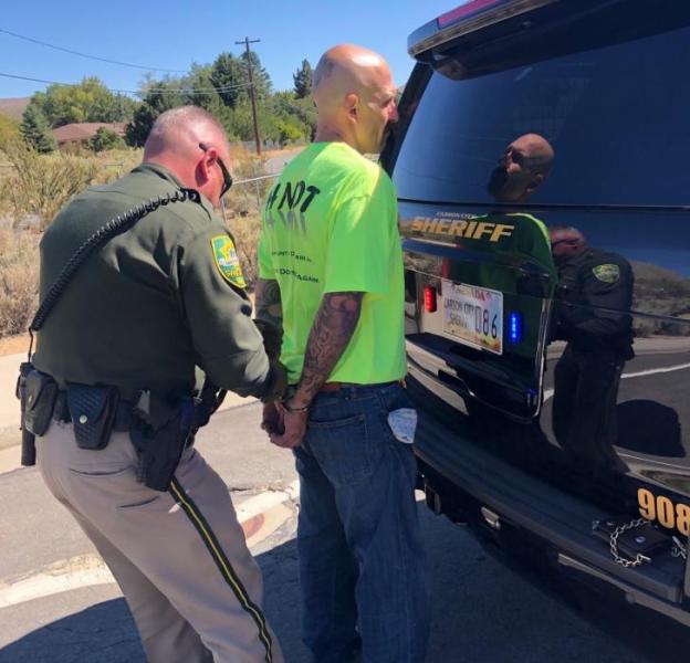 Suspect Aaron Davis Maurer is taken into custody Wednesday.