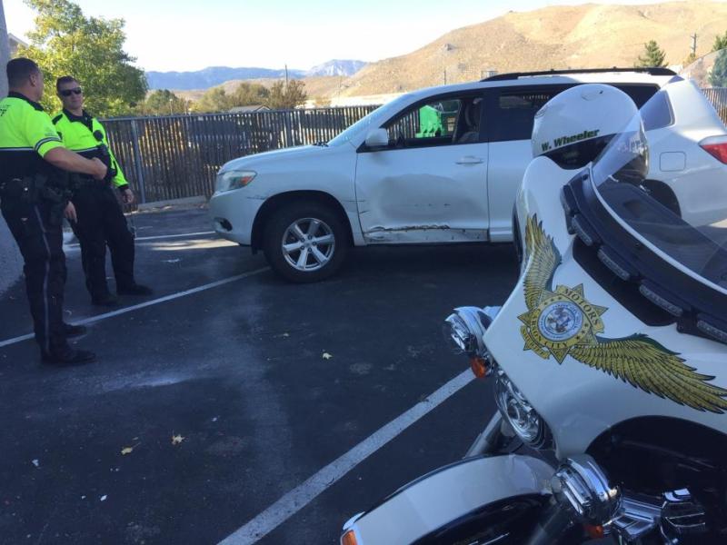 Carson City Sheriff's Office deputies located the damaged vehicle in a parking lot. The suspect was found walking on North Roop.