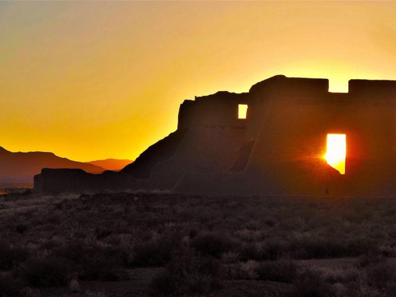 Photo by Brett Fisher. The setting sun creates a Nevada-shaped silhouette from the window of a Ft. Churchill ruin.