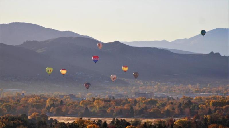 Photos by Brett Fisher. Hot air balloons launch from Carson Street in downtown Carson City Saturday morning to begin Nevada Day.