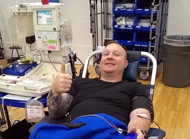 CHS teacher Kyle Jordan taking time at lunch to donate blood during the NHS blood drive Oct. 30.