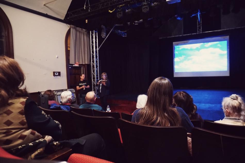 Founder Rhonda Abend discusses trivia questions Tuesday evening