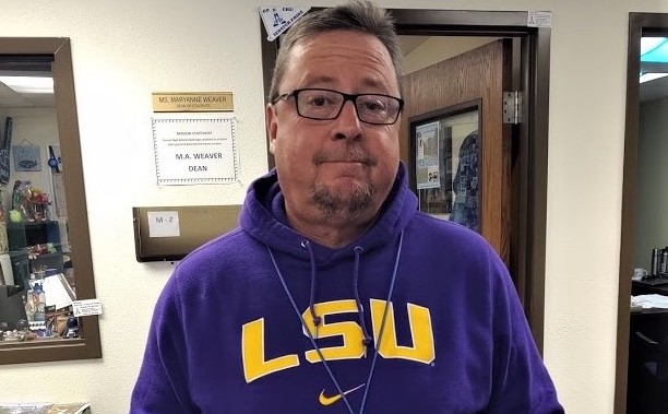 CHS staff member Greg displaying his undergraduate college degree during Throwback Thursday.