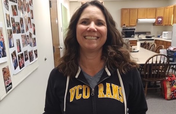 CHS teacher Brigette Pugh displaying her undergraduate Alma Mater during Throwback Thursday with teachers.