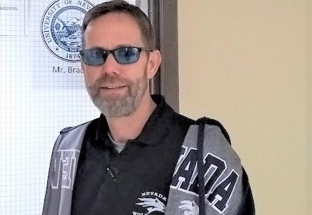 CHS teacher Jim Bean displaying his undergraduate Alma Mater during Throwback Thursday with teachers.