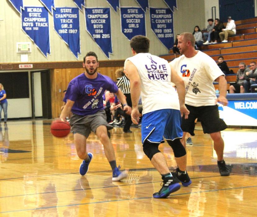 CHS and DHS teachers playing against the Carson and Douglas police officers Nov. 13. Photo Credit Allison Gill.