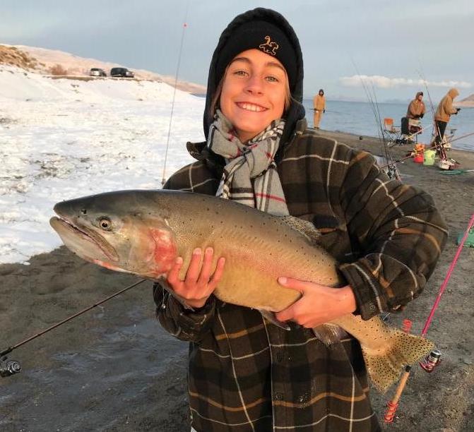 Taylor Kline, 12, of Orange County, Calif., with their 14 pound, 11 ounce cutthroat trout at Pyramid Lake.