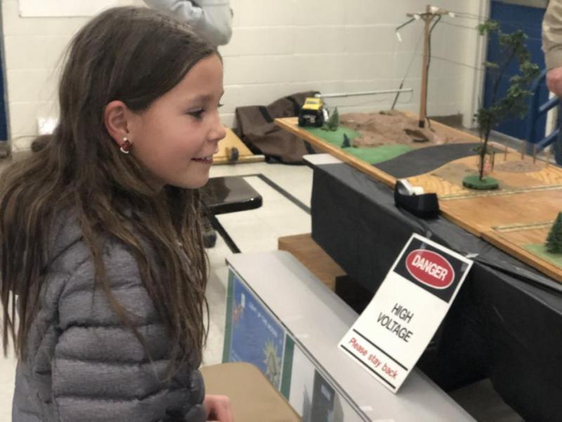An Empire Elementary School student interacts with STEM displays.