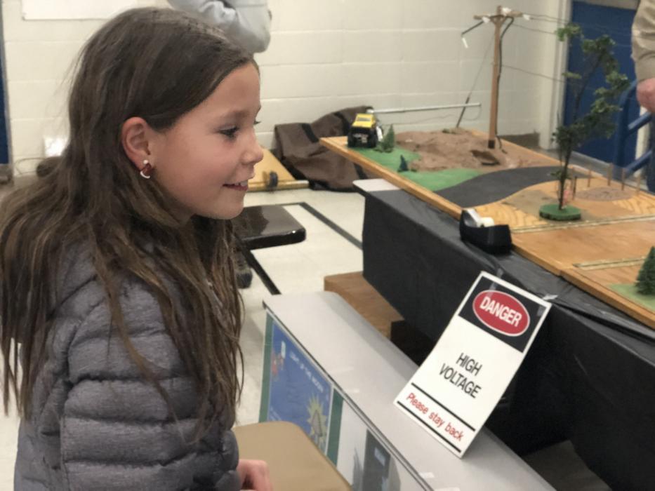 An Empire Elementary School student interacts with STEM displays.