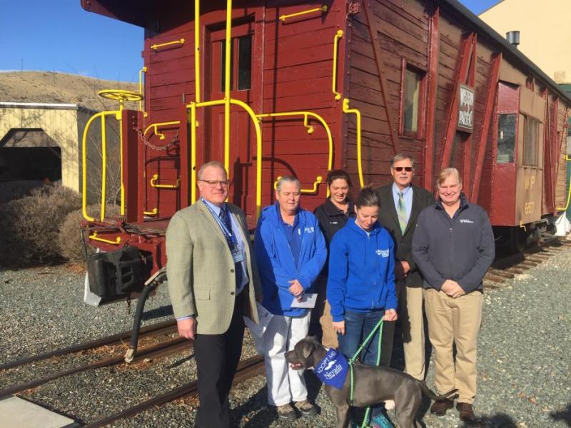 Representatives of the organizations receiving money pose for a photo at the Nevada Railroad Museum.