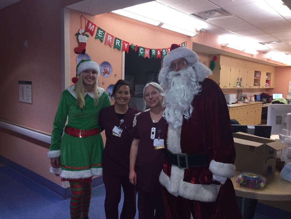 Nurses on the Pediatric ward with Santa Nick and Karen Jessop.