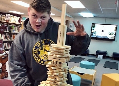CHS student Seth Argust displays creativity and, Librarian Ananda Campbell said this kid is pure sunshine; he makes me laugh.