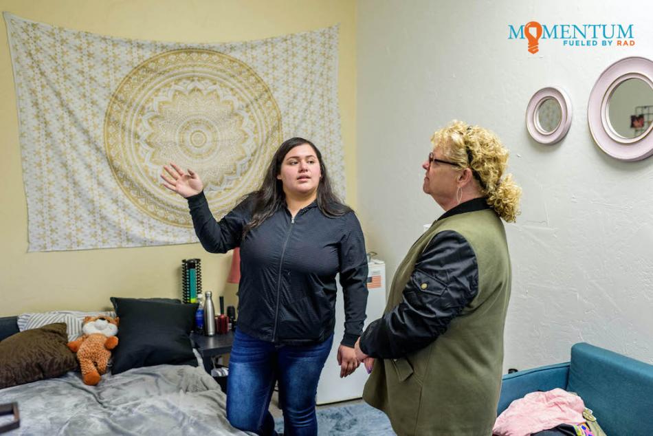Nancy Mejorado, 17, of Carson High School, explains the dangers in a mock teen bedroom to Karen Styles, of Carson City.