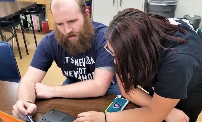 CHS senior Destiny Hernandez discussing her Senior Project with CHS Agrigultural teacher Mr. Mann.