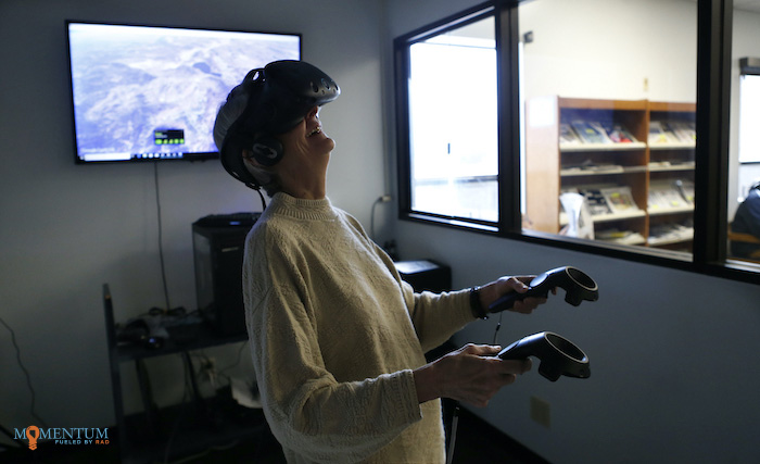 Barbara Pefley is introduced to virtual reality at the Carson City Library. Photo by Cathleen Allison, Nevada Momentum