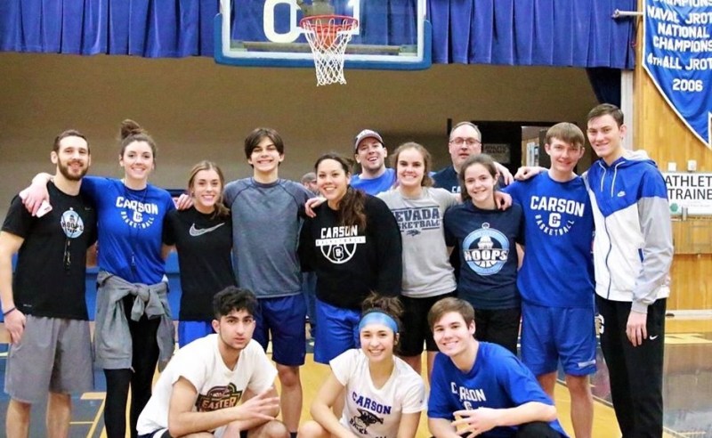 CHS teacher and Varsity Basketball Coach Jordan Glover, and both Varsity Boys and Varsity Girls players hold basketball clinic.
