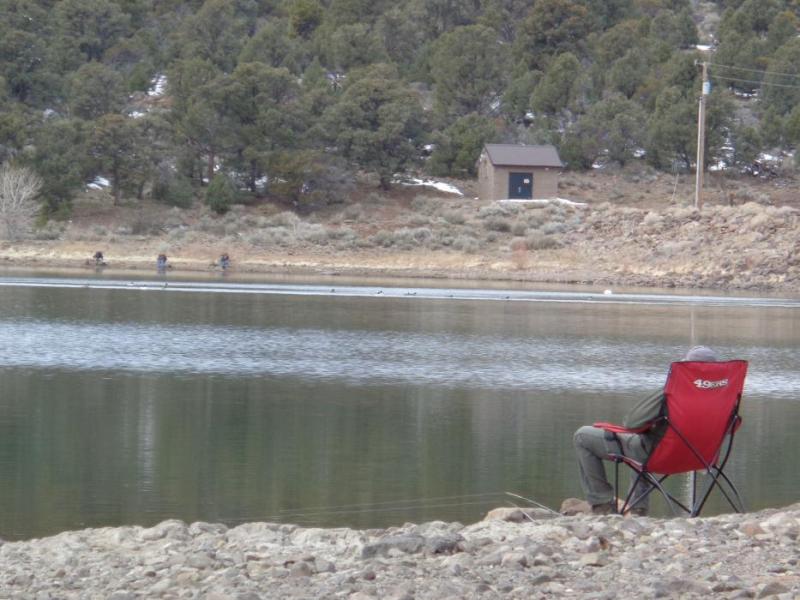 Indian Creek Reservoir. Fellow angler use distancing to fish. There are 3 anglers on the other shore 20 feet apart.