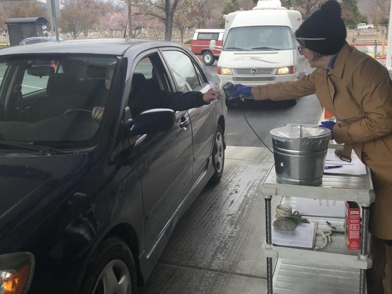 Brooke Santina checks in hungry seniors for lunch.