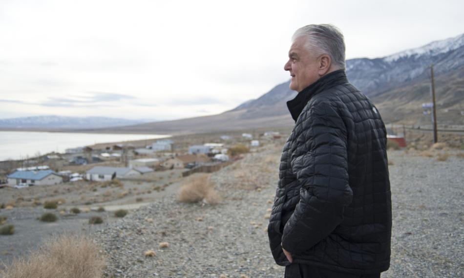 Governor-elect Steve Sisolak looks out over Walker Lake. (Daniel Clark/The Nevada Independent)